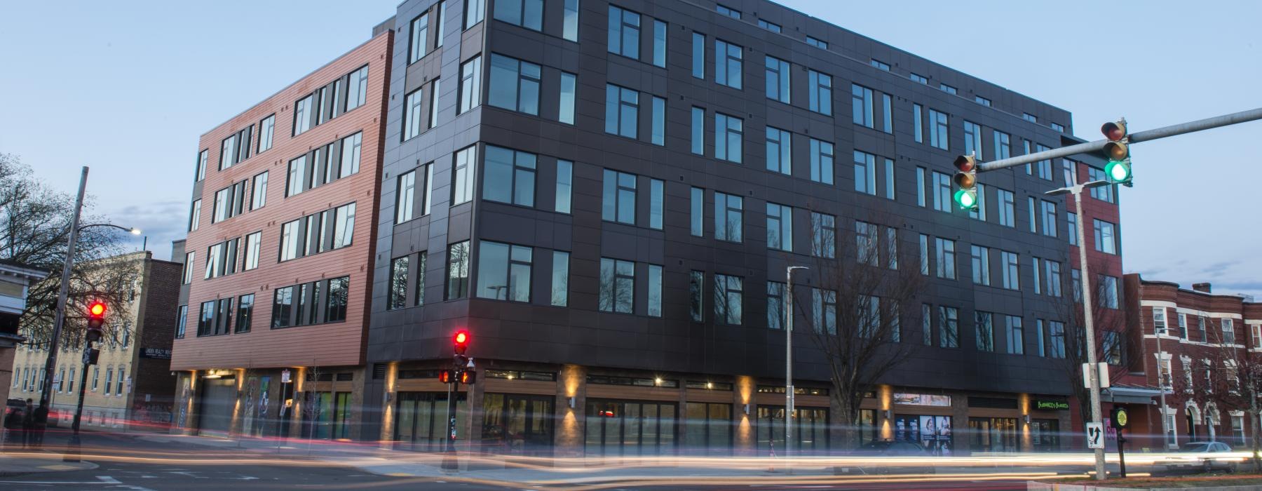 a large building with a street light with Martin Luther King Jr. Memorial Library in the background